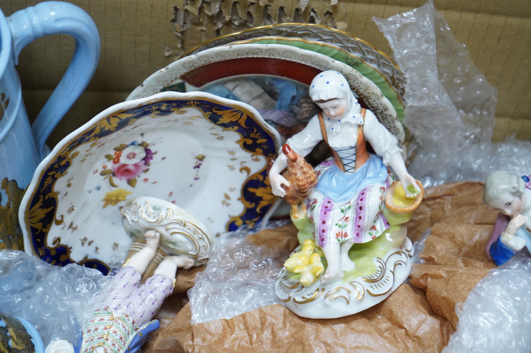 A collection of mixed ceramics including a Dresden figure and cabinet cups and saucers